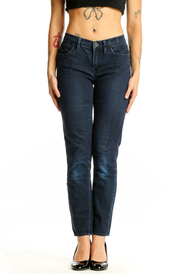 Front view of Madewell dark blue straight leg jeans on model