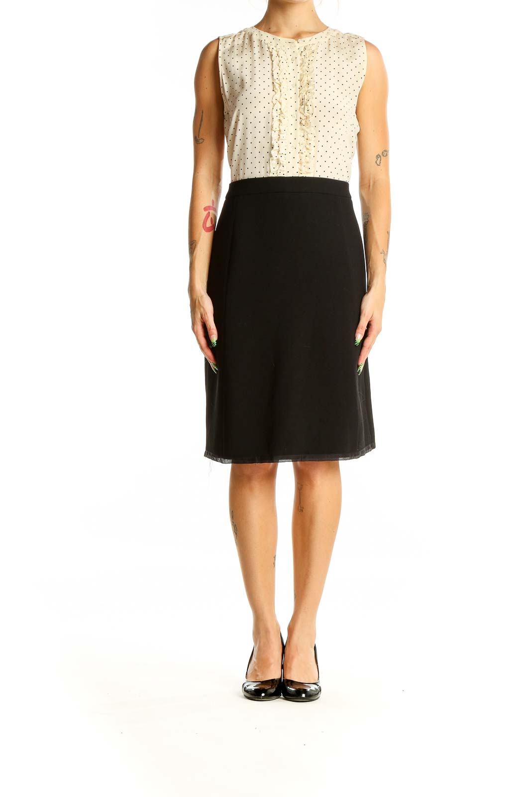 Front view of J.Crew cream polka dot sleeveless dress with black skirt