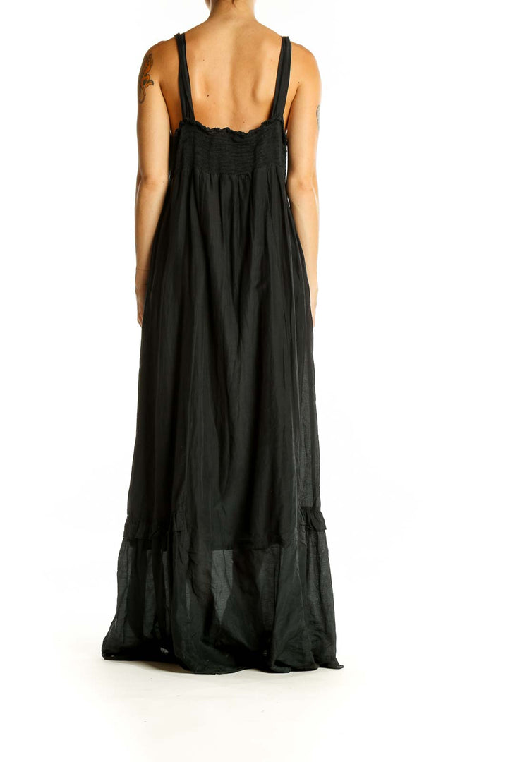 Back view of black maxi dress with adjustable straps by Free People x CP SHADES