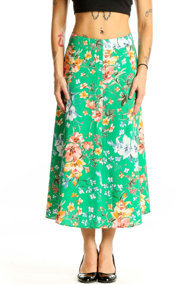 Front view of LOFT green floral midi skirt with A-line silhouette