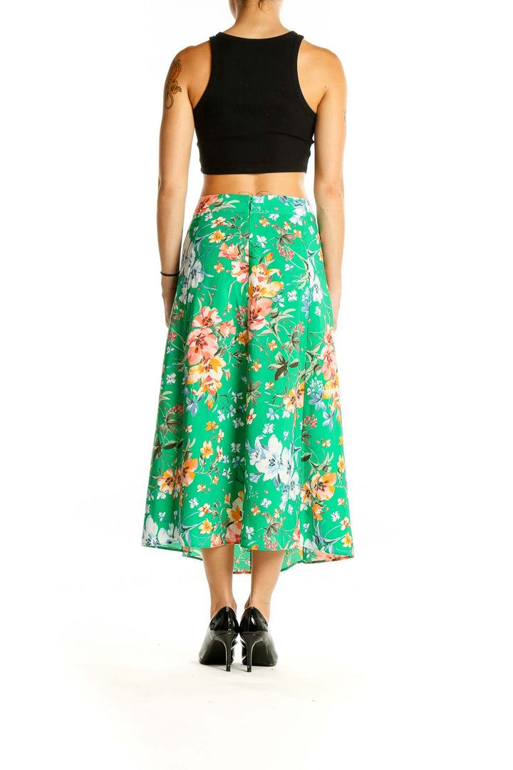 Back view of LOFT green floral midi skirt showing full length and pattern