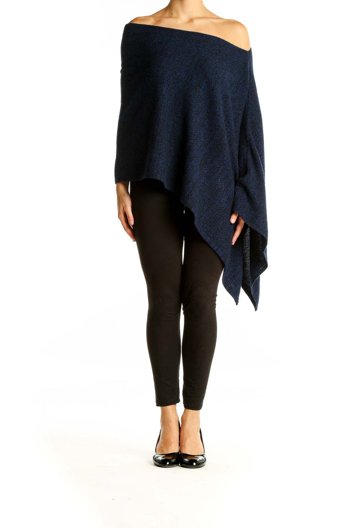 Front view of Magaschoni New York navy blue off-shoulder knit poncho with asymmetric hem