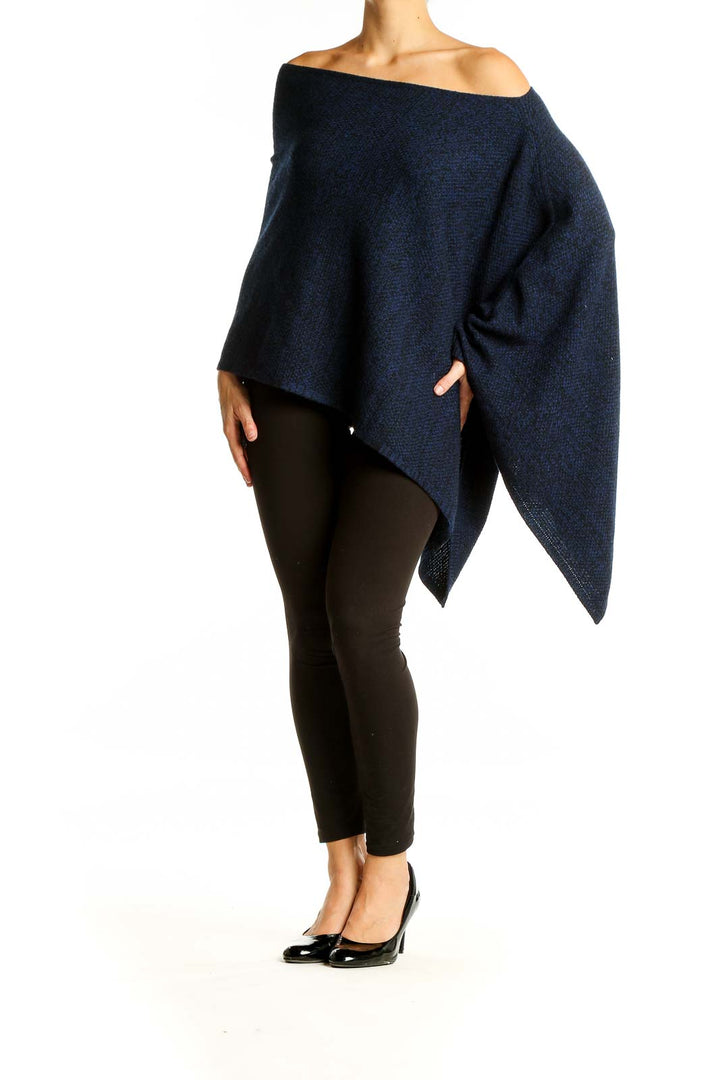 Front view of Magaschoni New York navy blue off-shoulder knit poncho with asymmetric hem