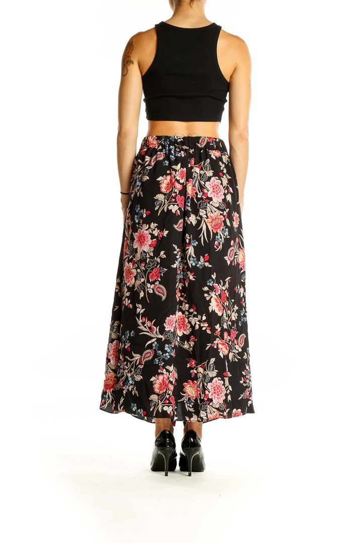 Back view of LOFT black floral maxi skirt showing full length and pattern