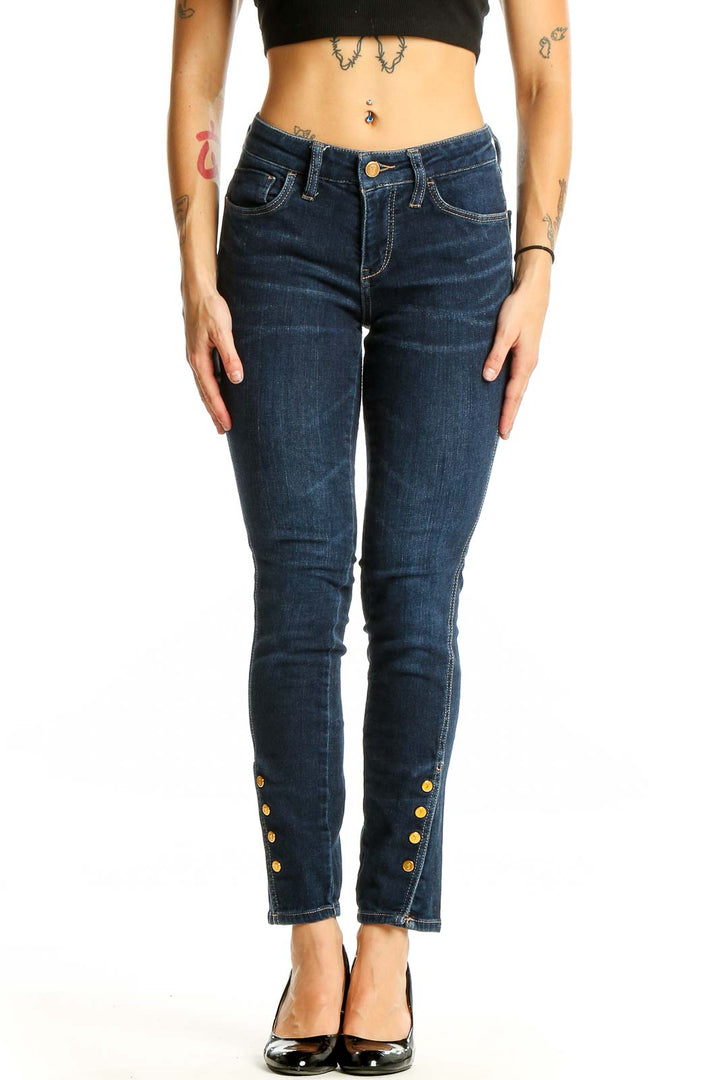 Front view of Pilcro and the Letterpress dark blue skinny jeans with gold button details