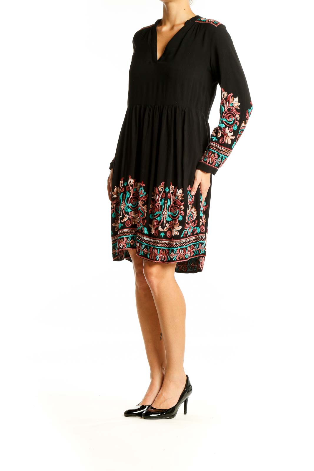 Front view of Floreat black midi dress with colorful embroidery