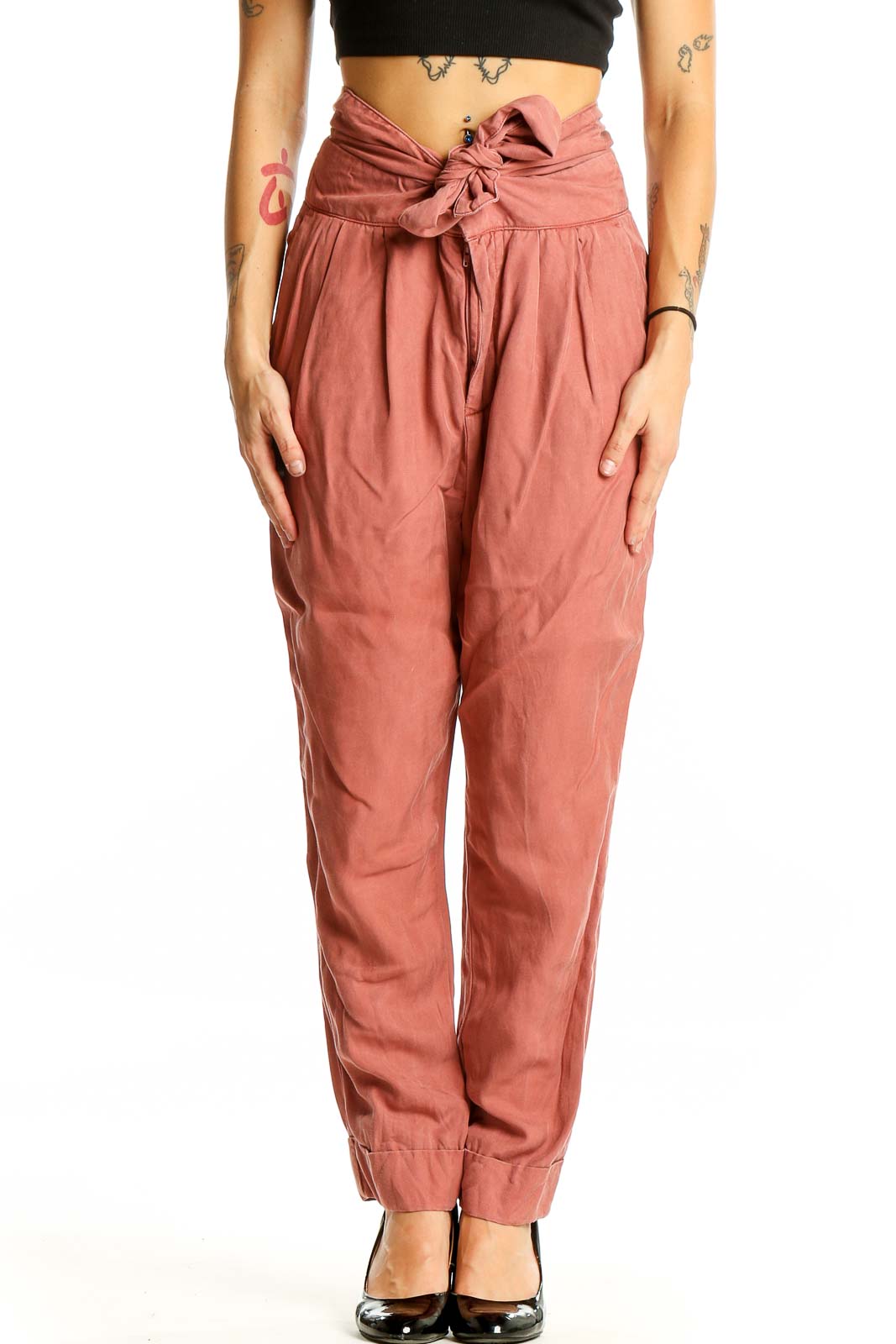 Front view of Cartonnier terracotta high-waisted pants with tie-front detail