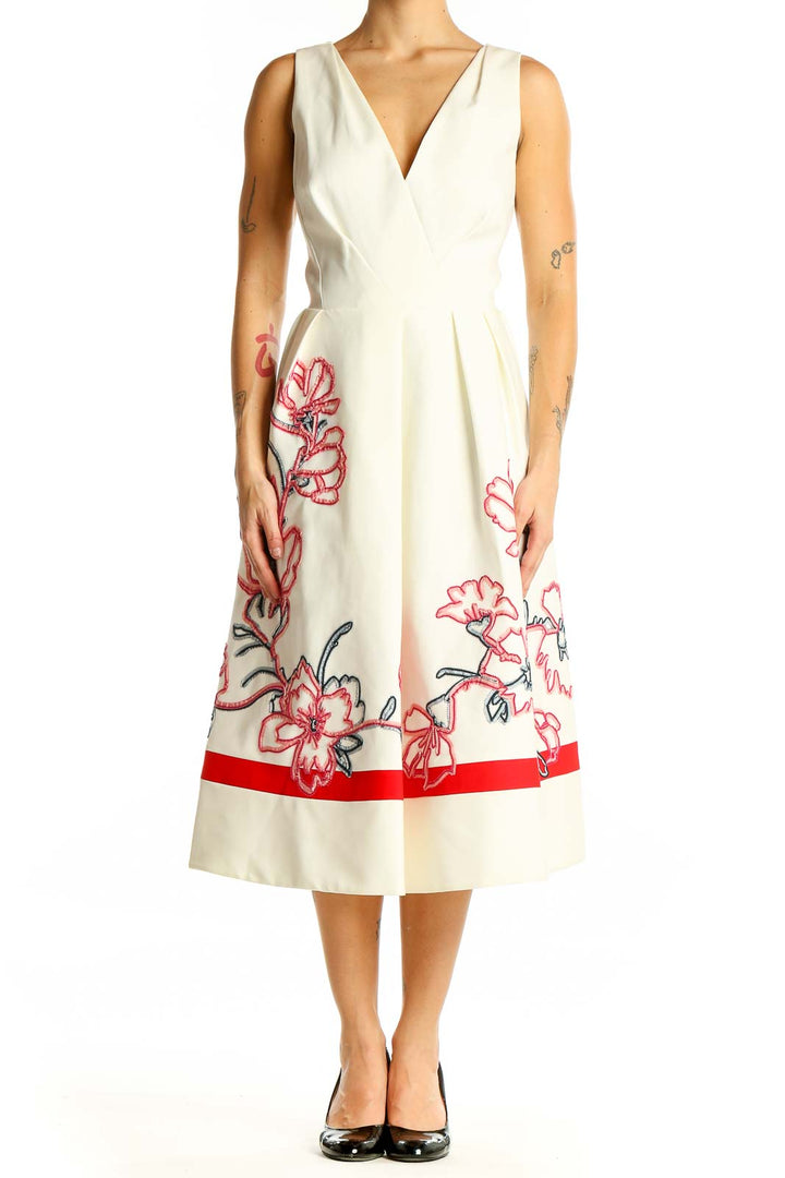 Front view of Karen Millen ivory midi dress with red floral embroidery