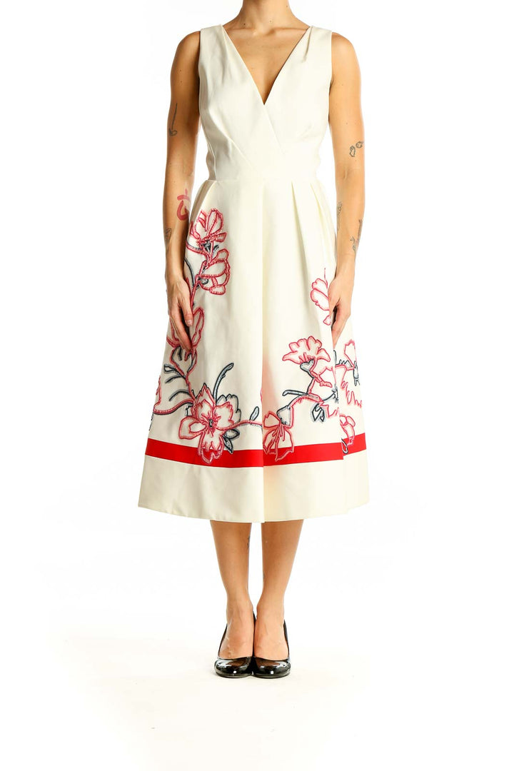 Front view of Karen Millen ivory midi dress with red floral embroidery