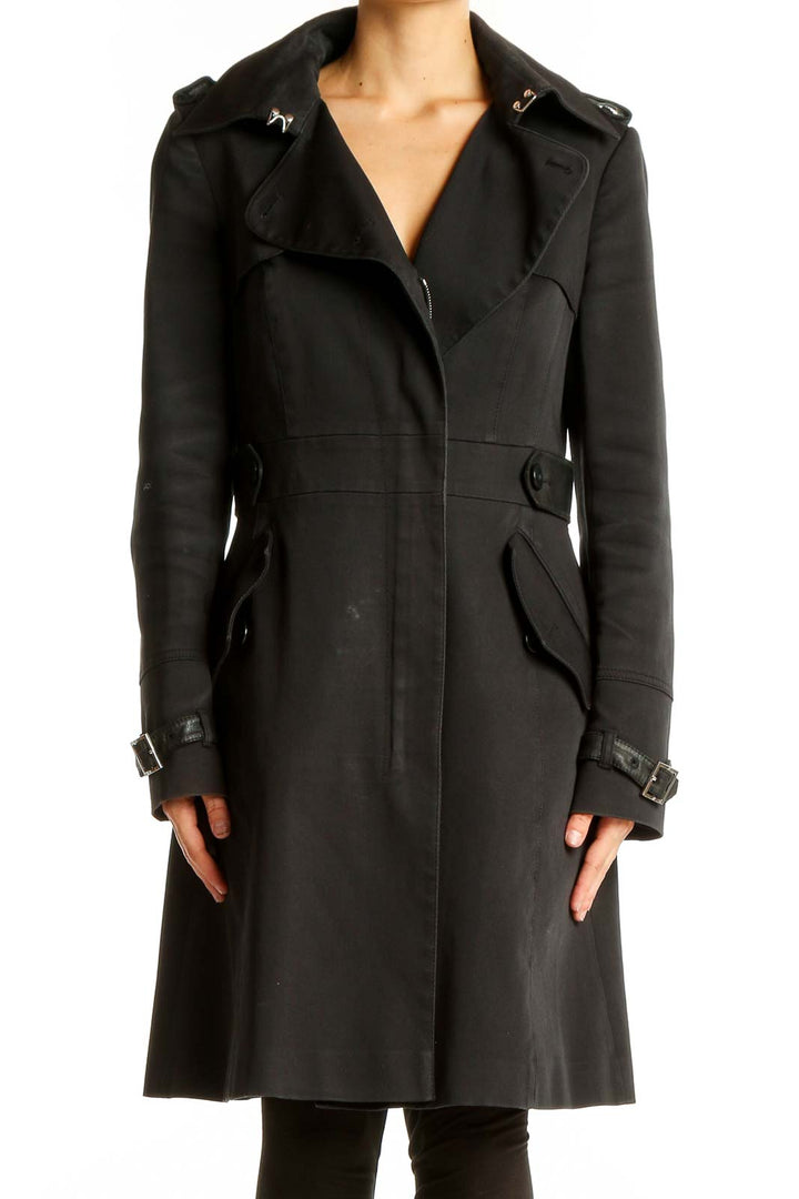 Front view of Karen Millen black trench coat with belt and epaulettes