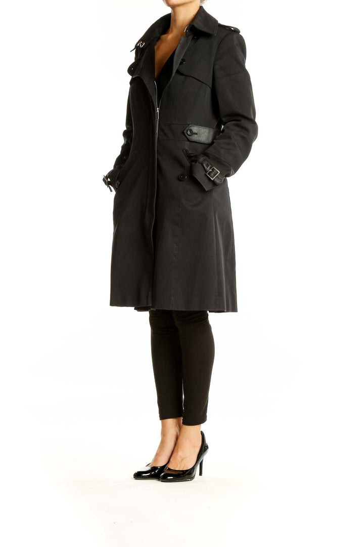 Front view of Karen Millen black trench coat with belt and epaulettes