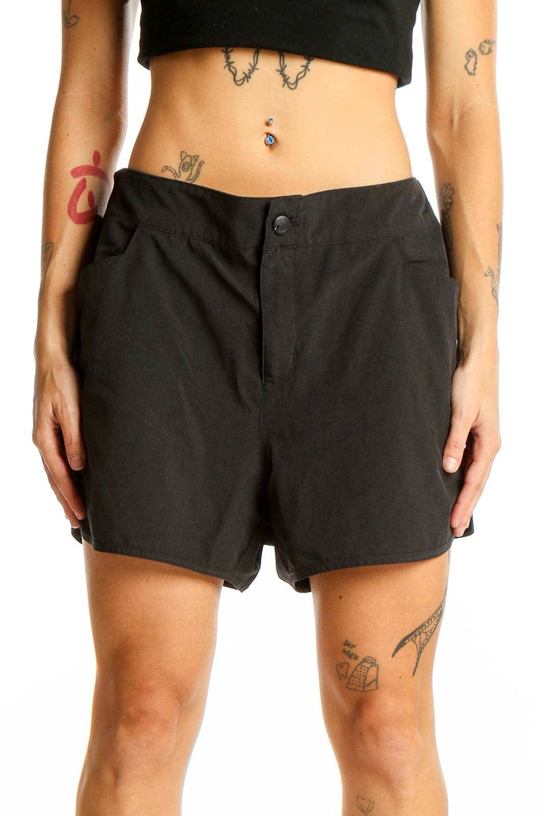 Front view of black Magellan Outdoors athletic shorts with side pockets