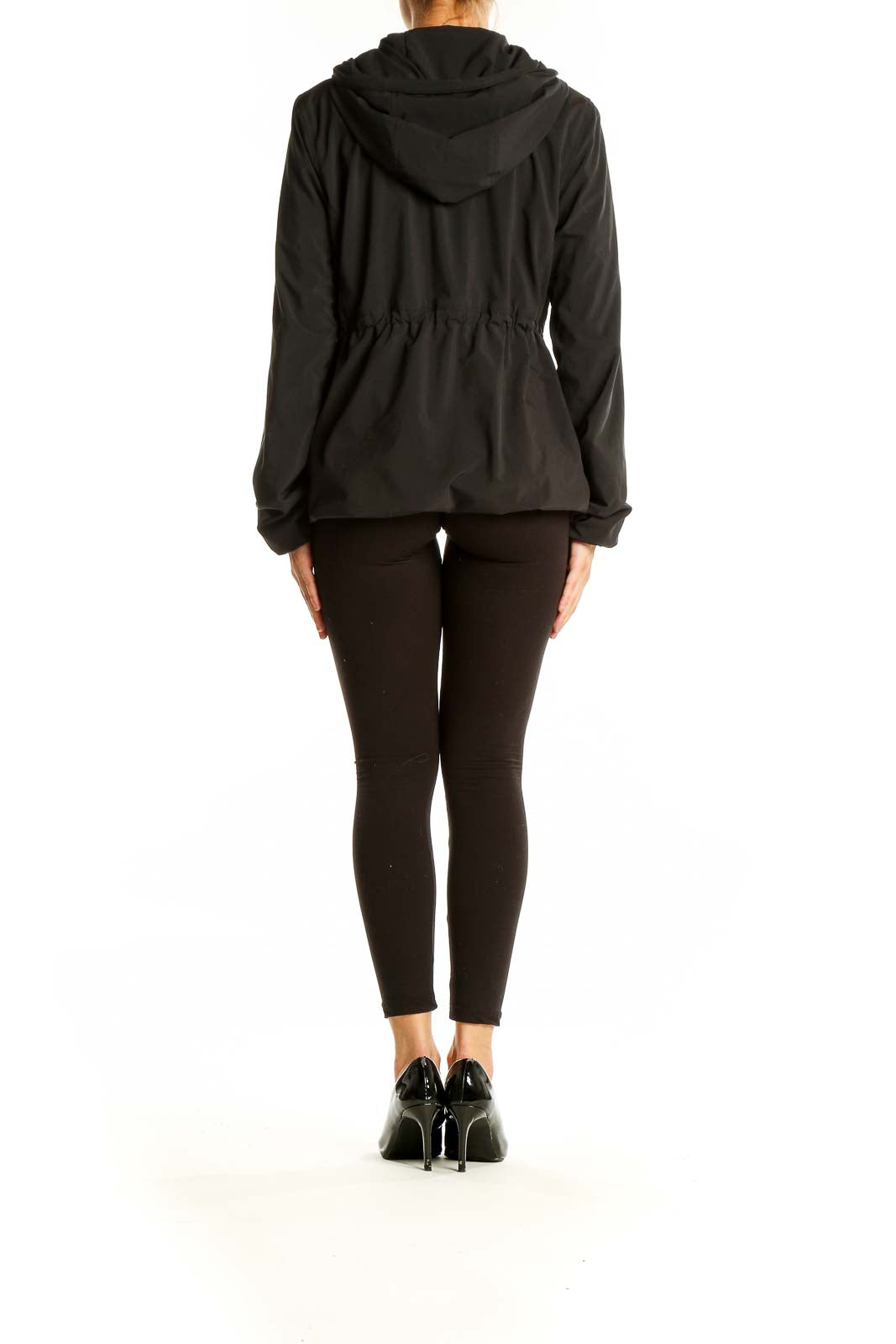 Back view of black Lululemon zip-up hooded jacket showing hood detail