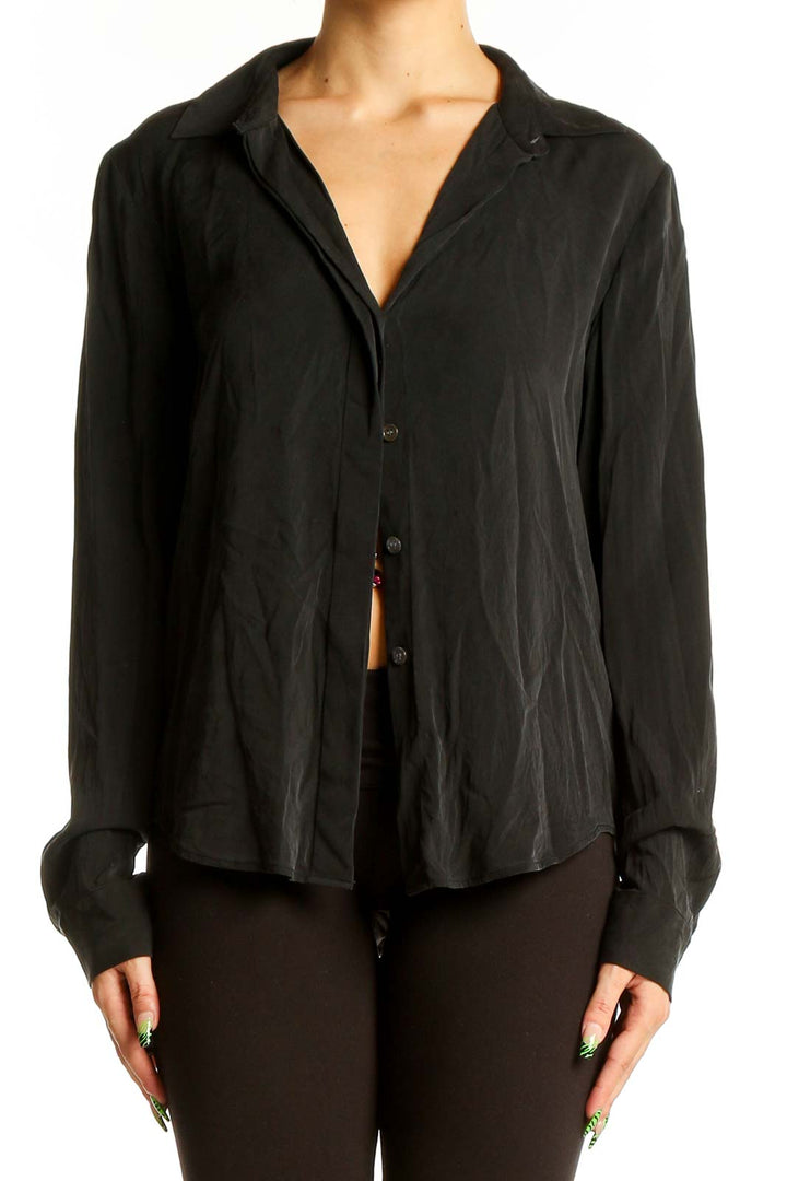 Front view of Theory black silk-blend button-up blouse with V-neckline