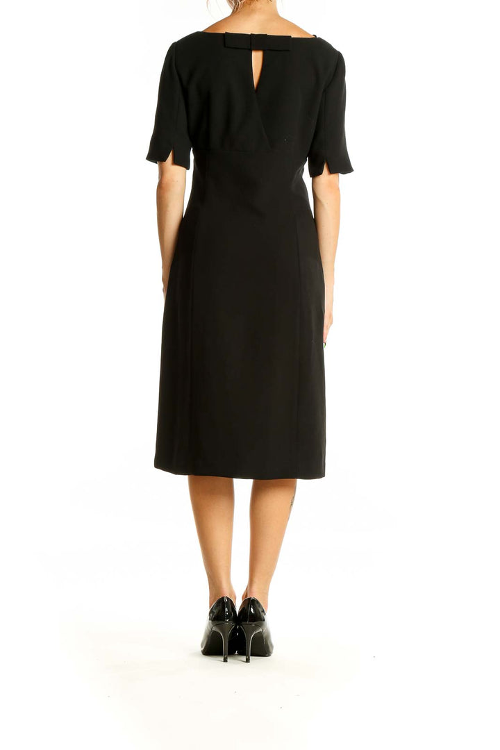 Back view of Ann Taylor black midi dress showing keyhole detail