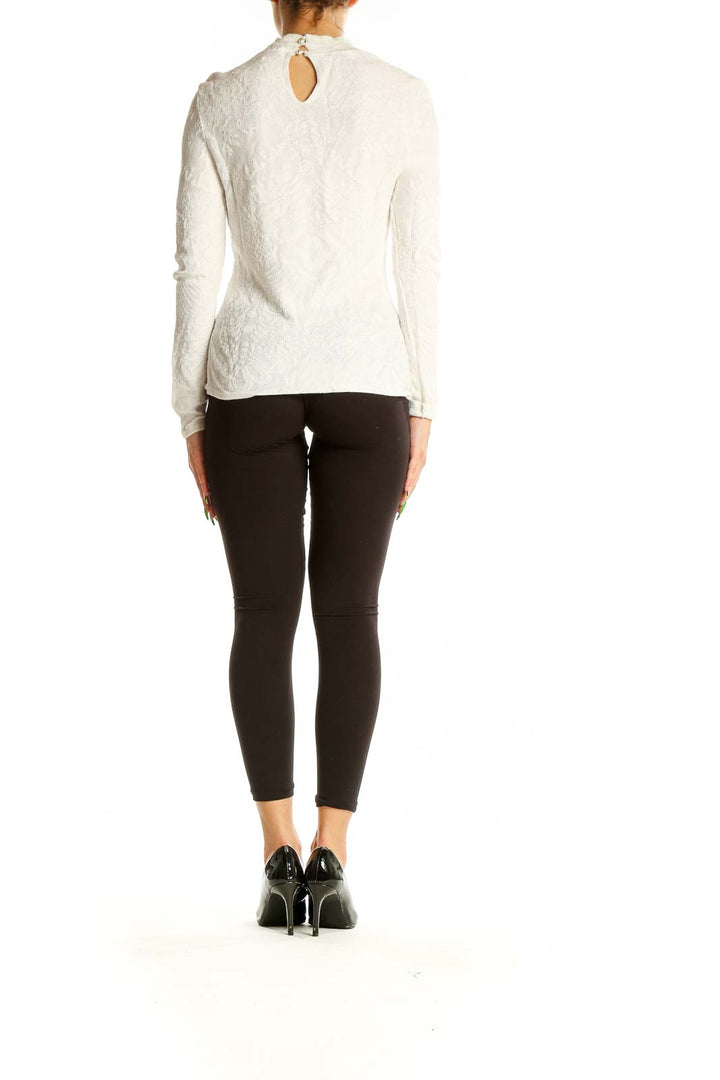 White textured mock neck knit top from White House Black Market, back view with keyhole detail