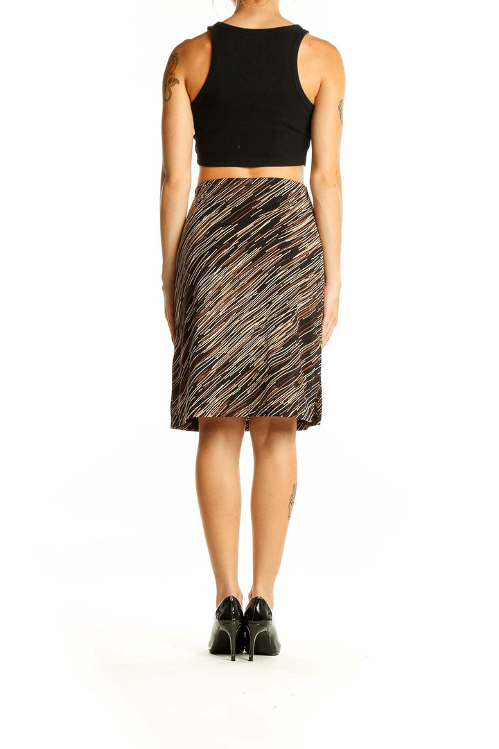 Back view of SilkRoll brown striped pencil skirt on model