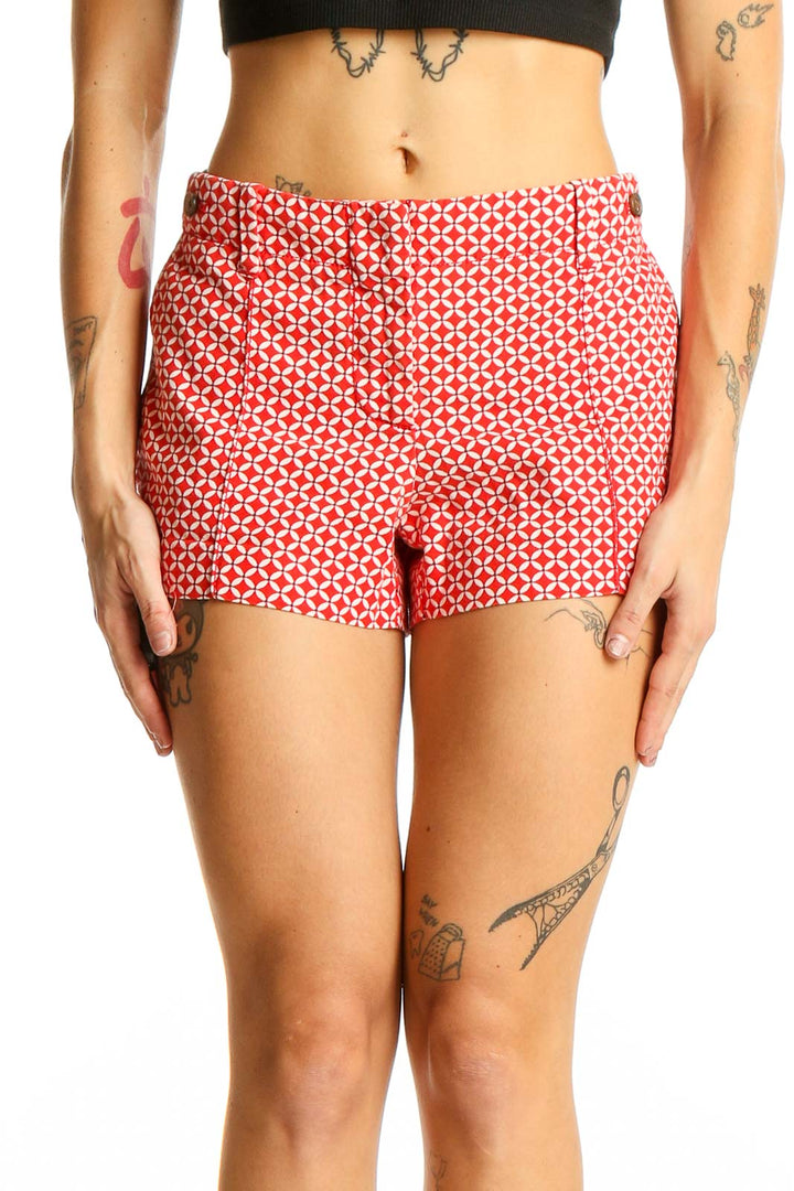 Front view of red J.Crew shorts with white geometric circle print