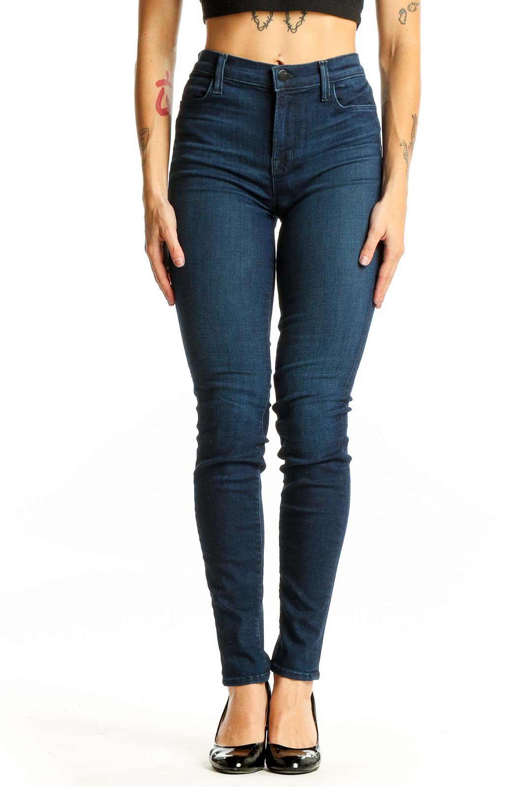 Front view of J Brand dark blue high-waisted skinny jeans on model