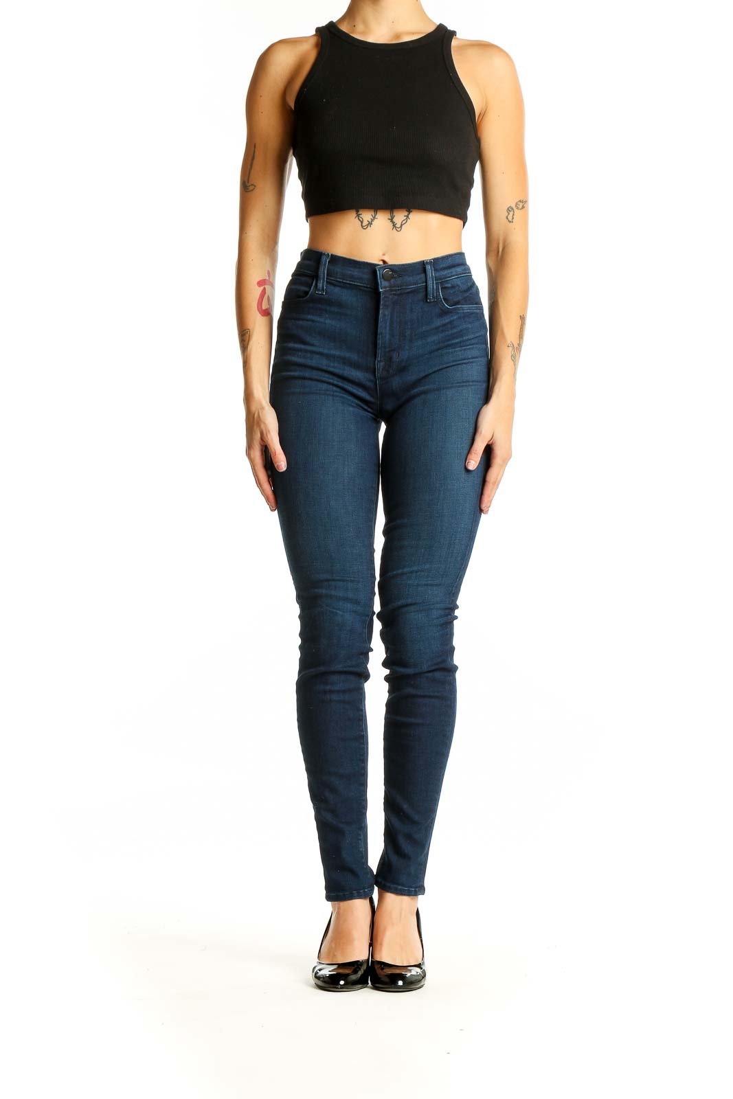 Front view of J Brand dark blue high-waisted skinny jeans on model