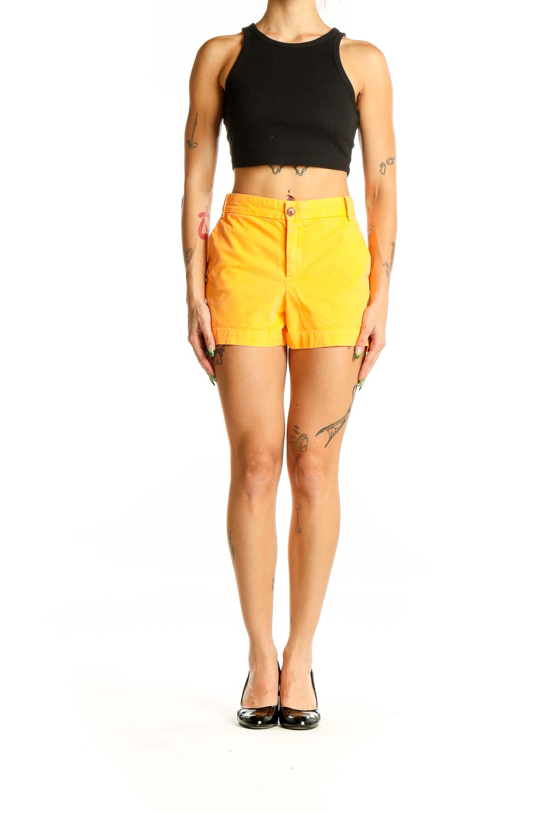 Front view of yellow Gap denim shorts on model