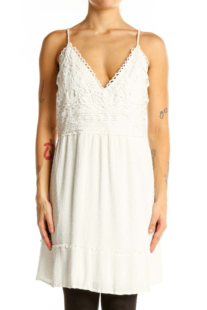 Front view of white lace trim rayon sundress with V-neckline