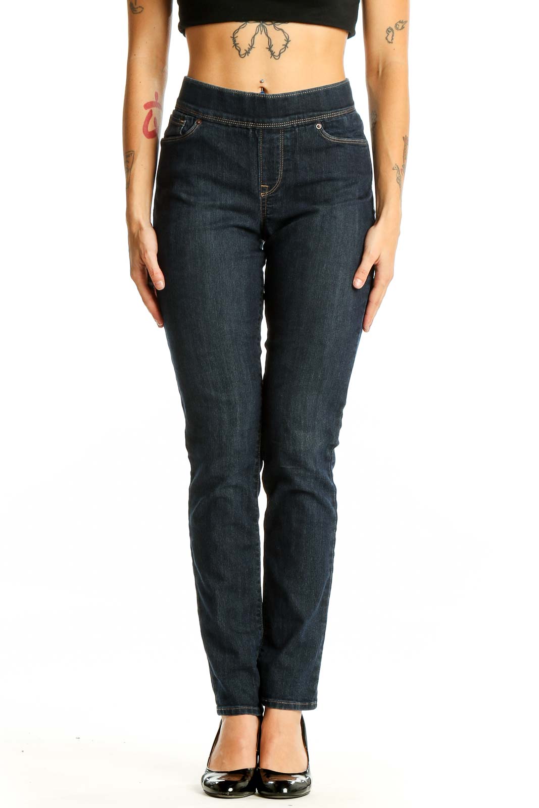 Front view of Levi's dark blue slim fit jeans on model