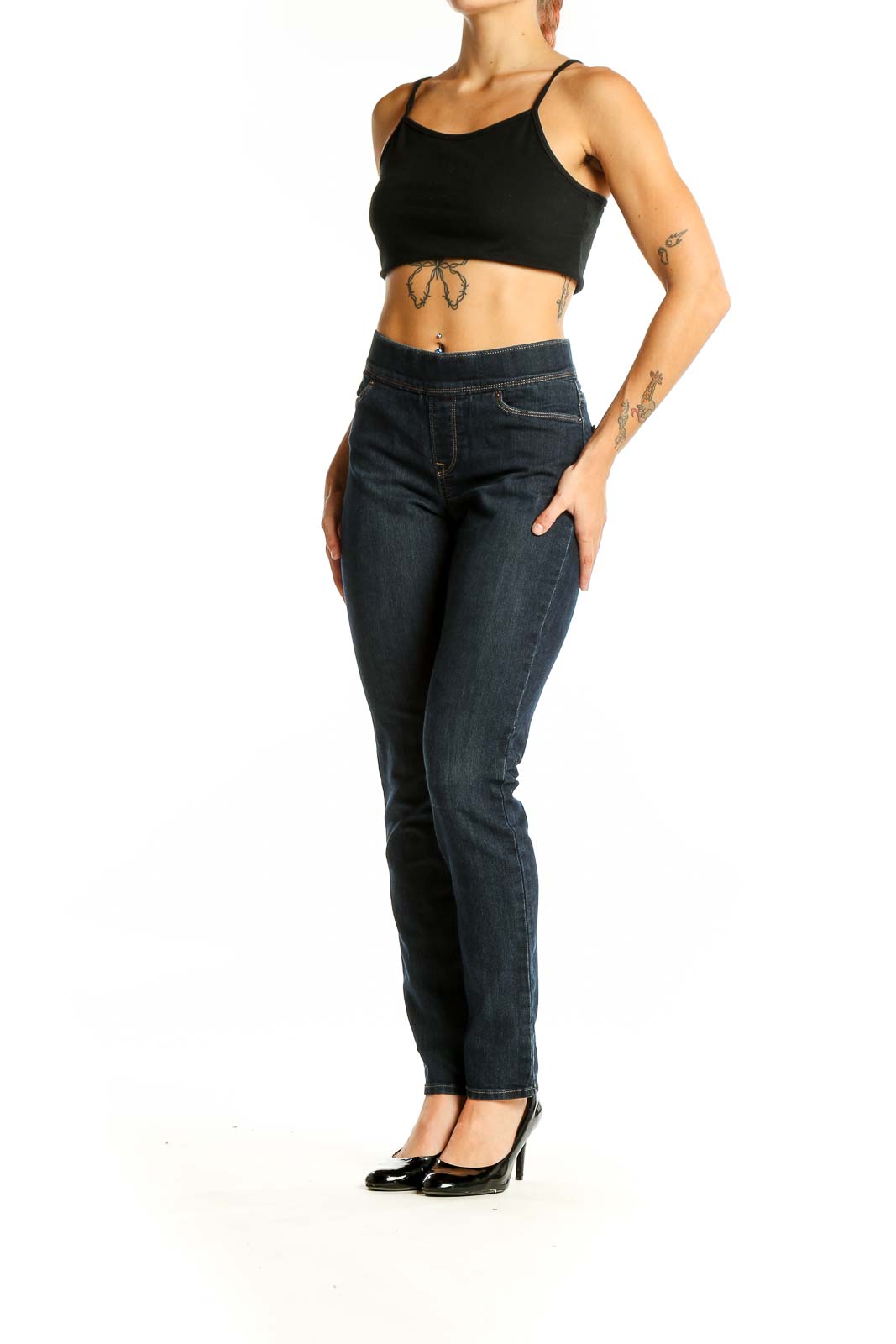 Front view of Levi's dark blue slim fit jeans on model