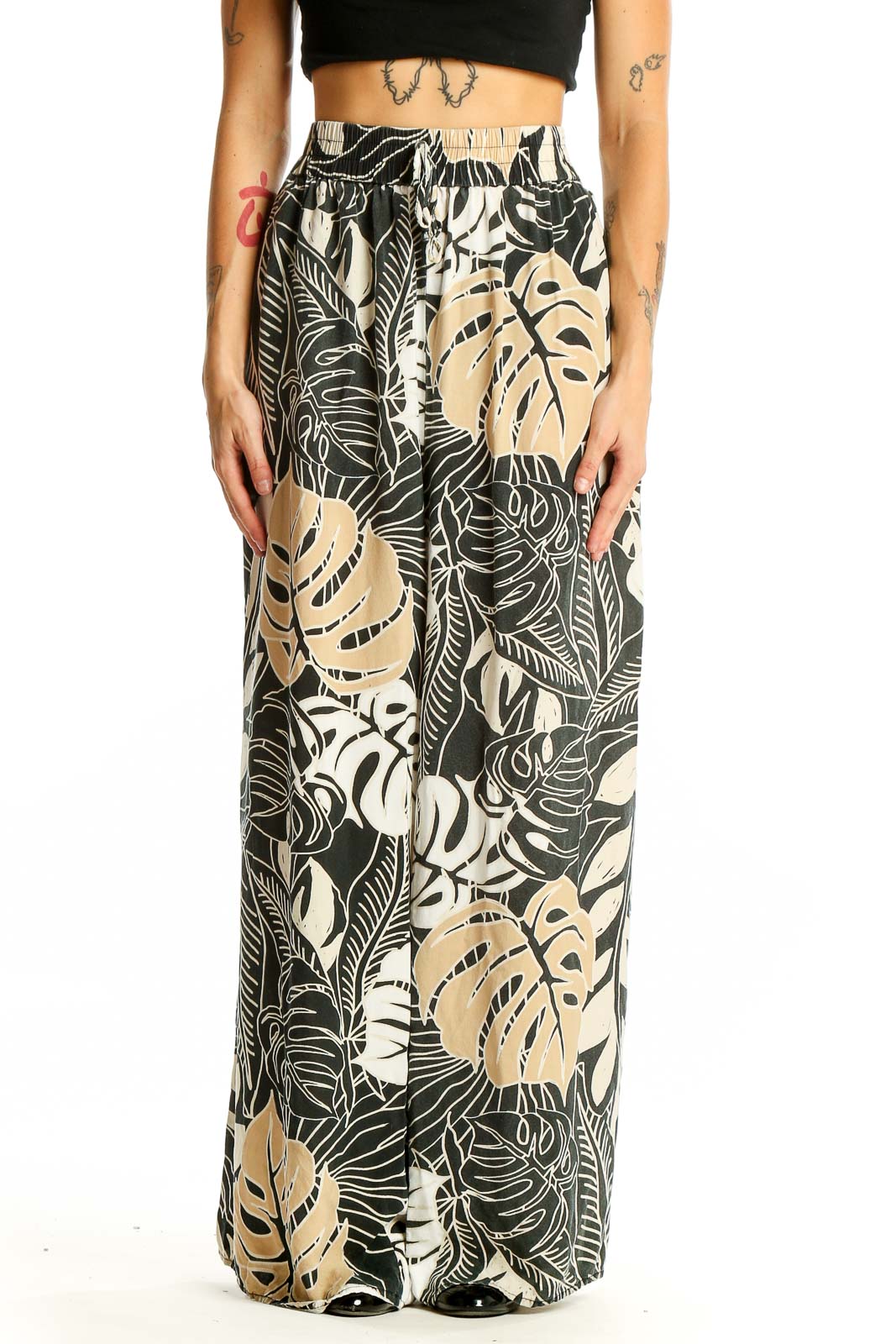 Front view of Millenium Black and Beige Tropical Print Wide-Leg Pants