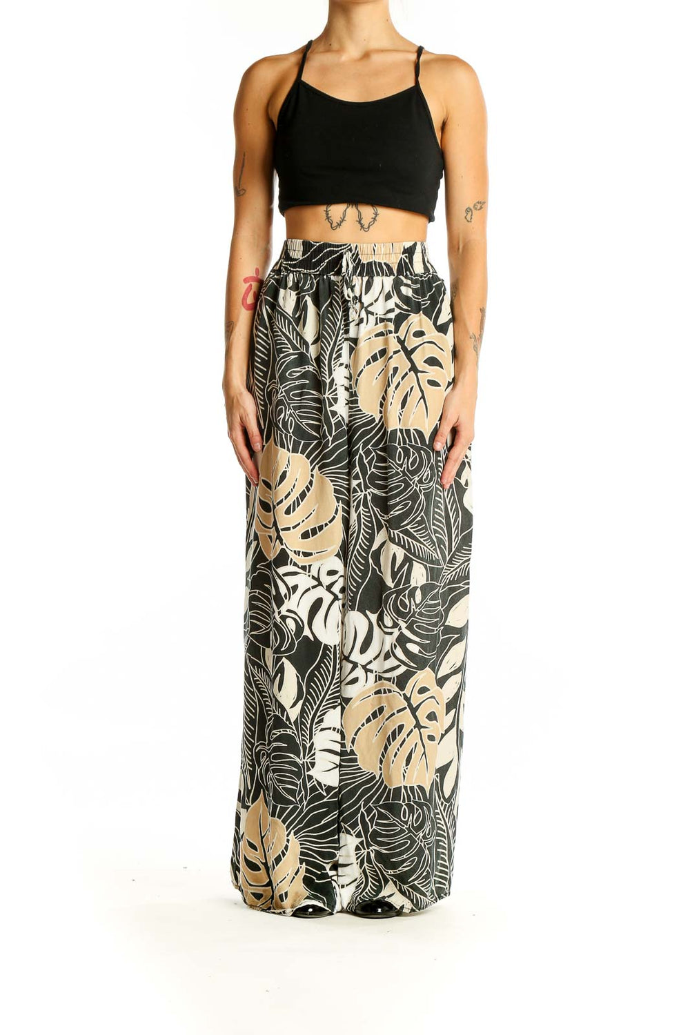 Front view of Millenium Black and Beige Tropical Print Wide-Leg Pants