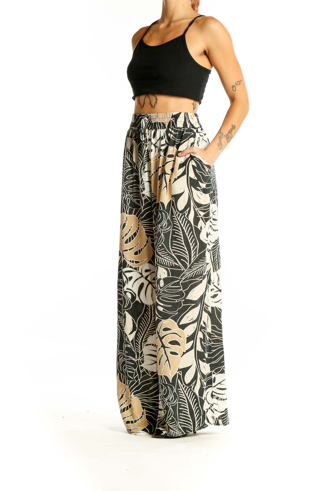 Front view of Millenium Black and Beige Tropical Print Wide-Leg Pants