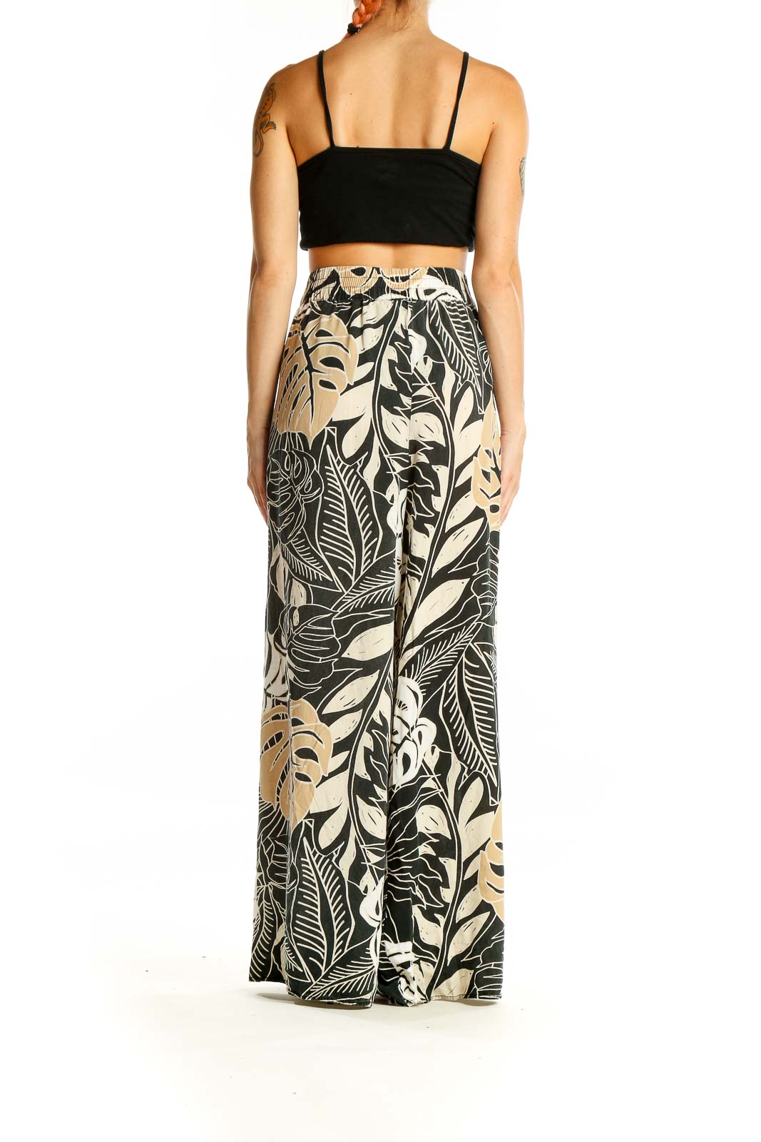 Back view of Millenium Black and Beige Tropical Print Wide-Leg Pants