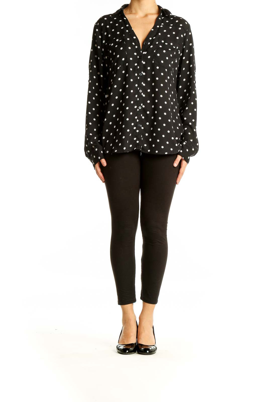 Front view of Express black polka dot button-up blouse