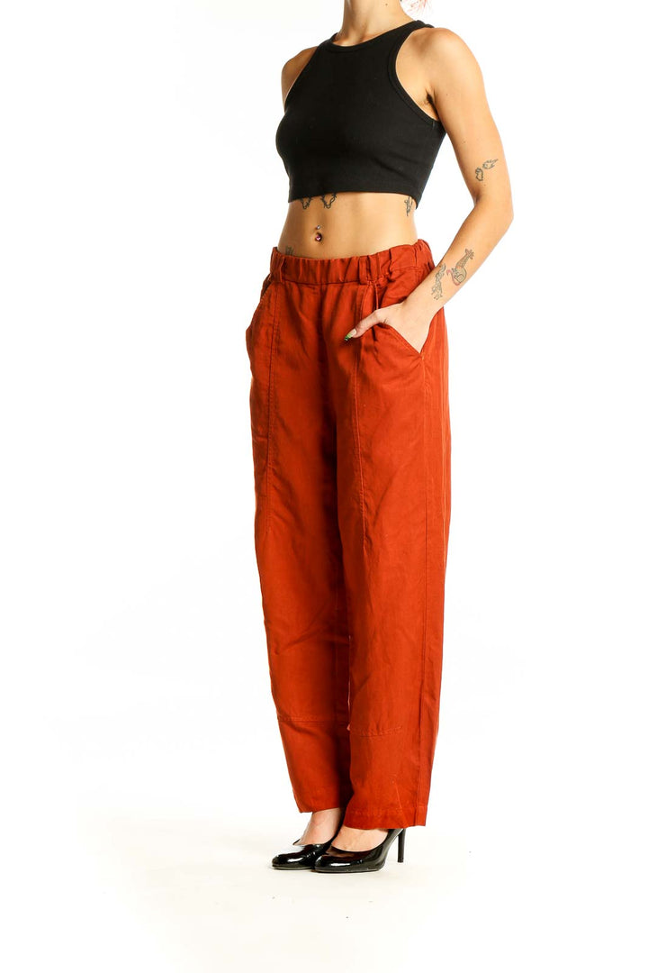 Front view of Eileen Fisher rust linen blend wide-leg pants