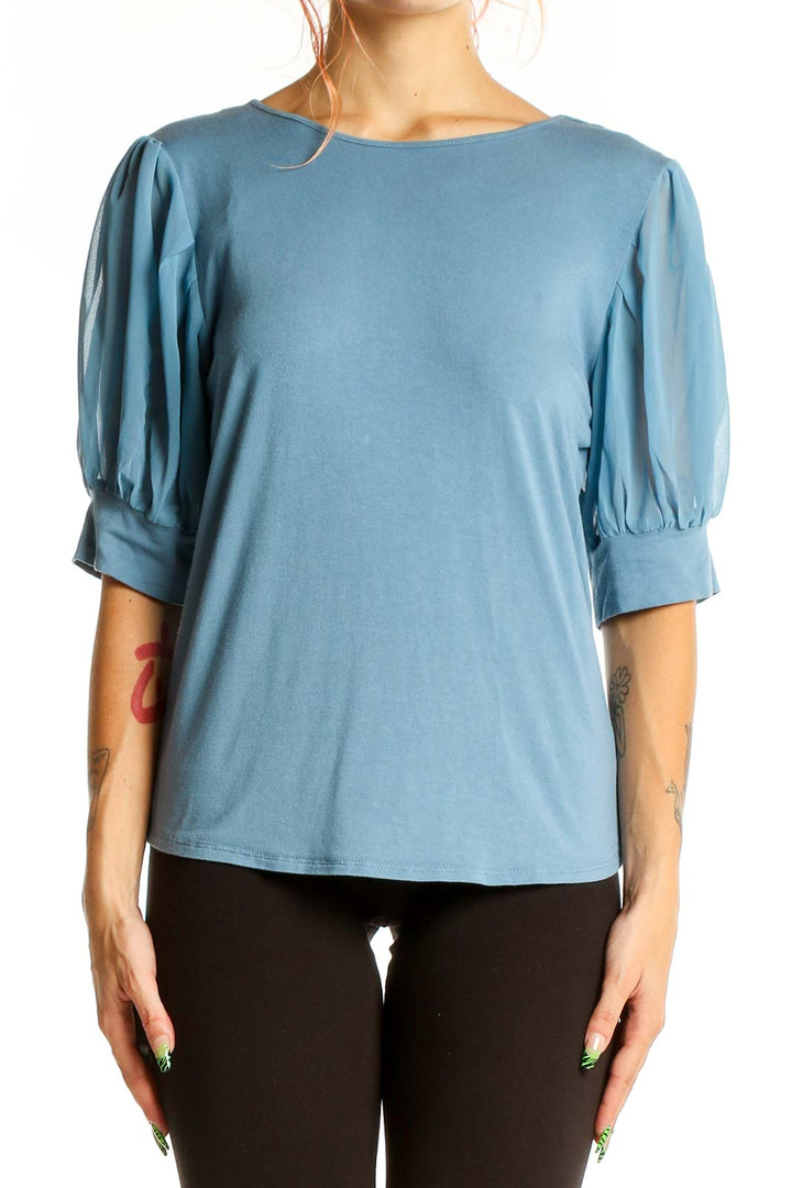 Front view of Vince Camuto blue puff sleeve blouse