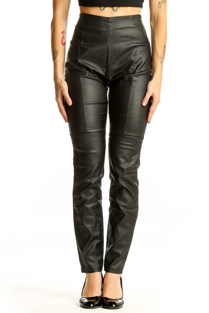 Front view of black faux leather high-waisted skinny pants