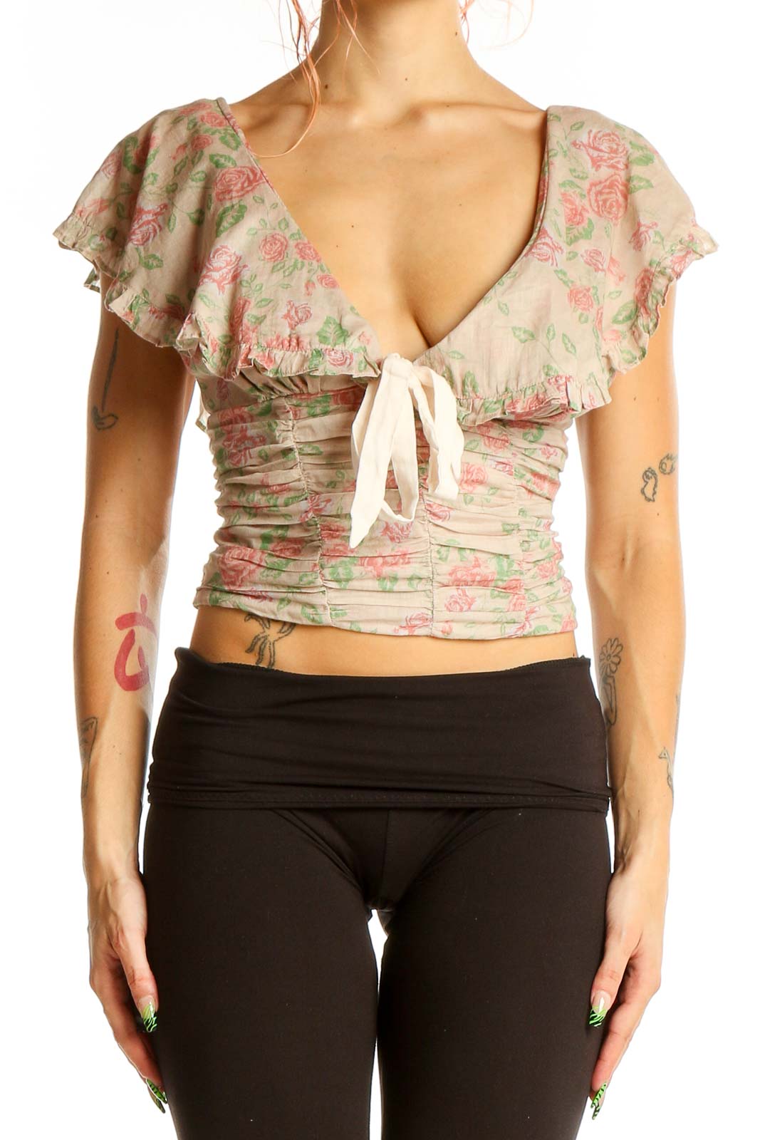 Front view of Free People beige floral crop top with ruched bodice and cap sleeves