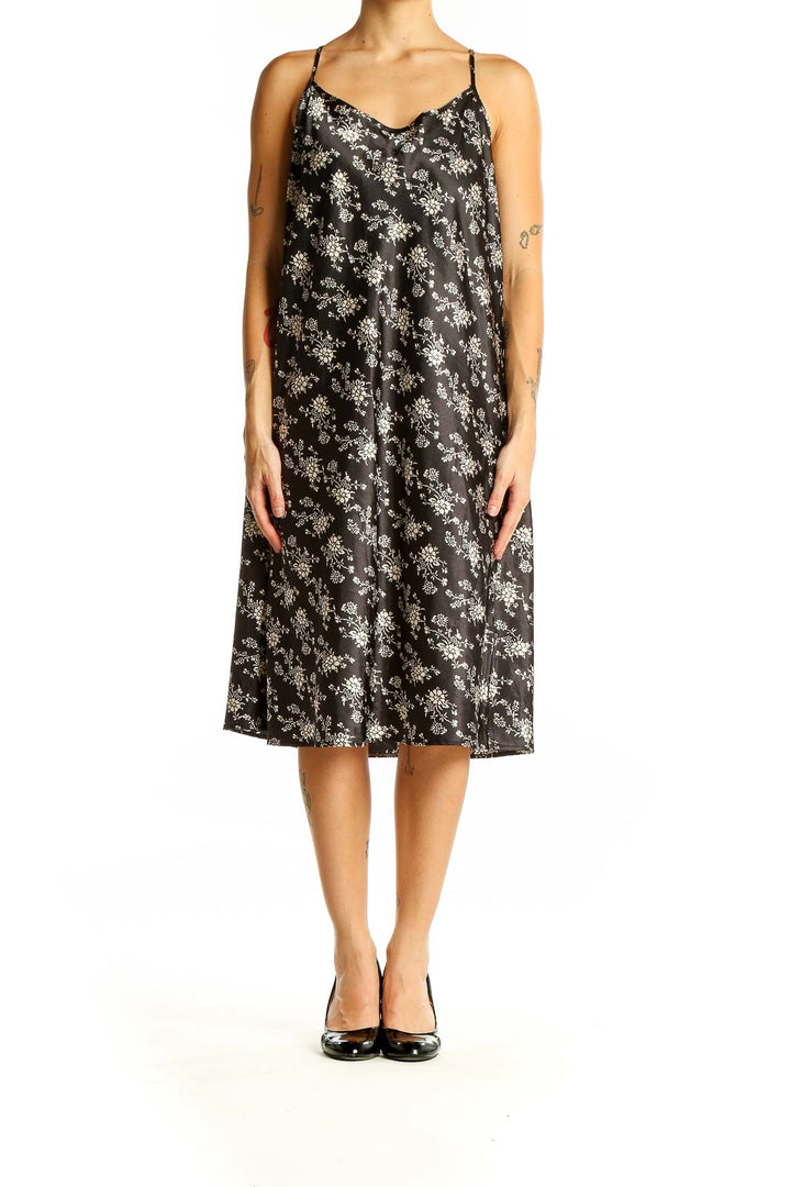 Front view of SilkRoll black floral print slip dress with V-neck and thin straps