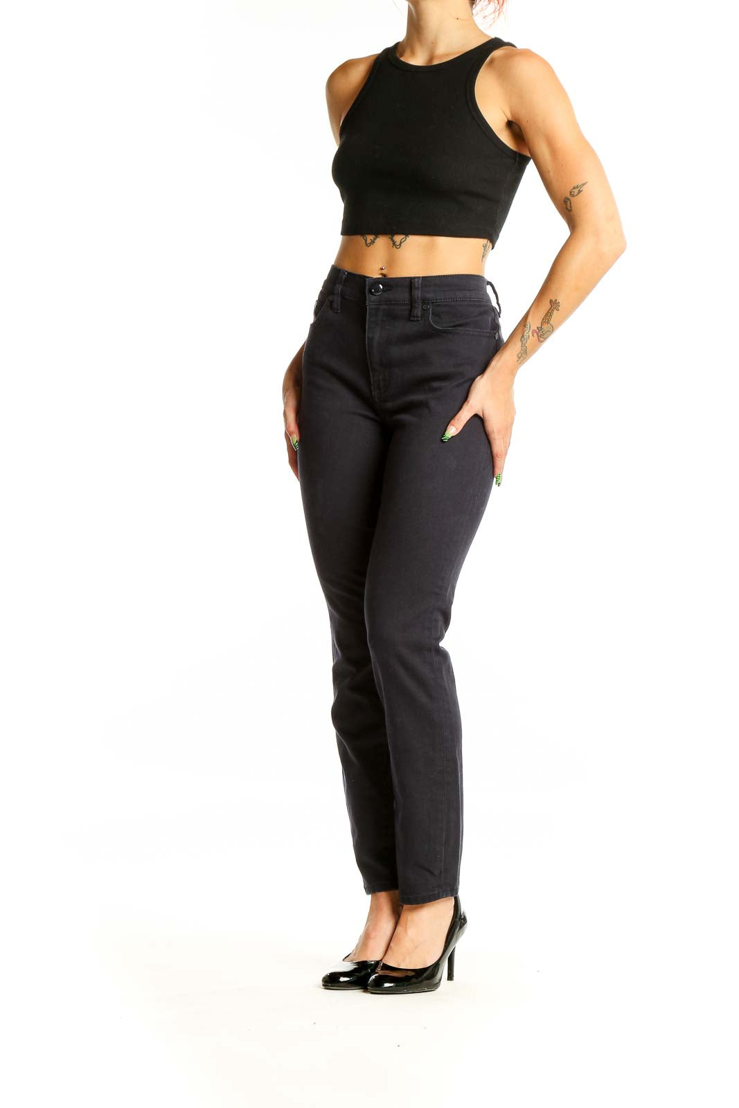 Front view of Tory Burch black straight-leg jeans on model