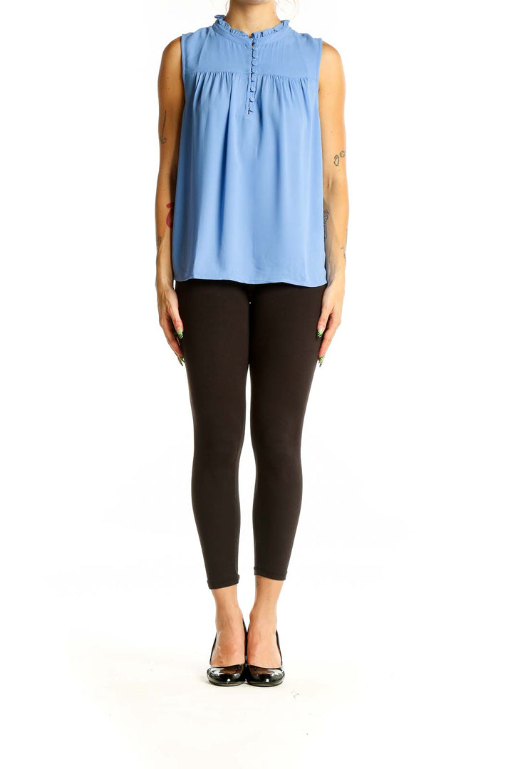 Front view of J.Crew blue sleeveless blouse with ruffled neckline