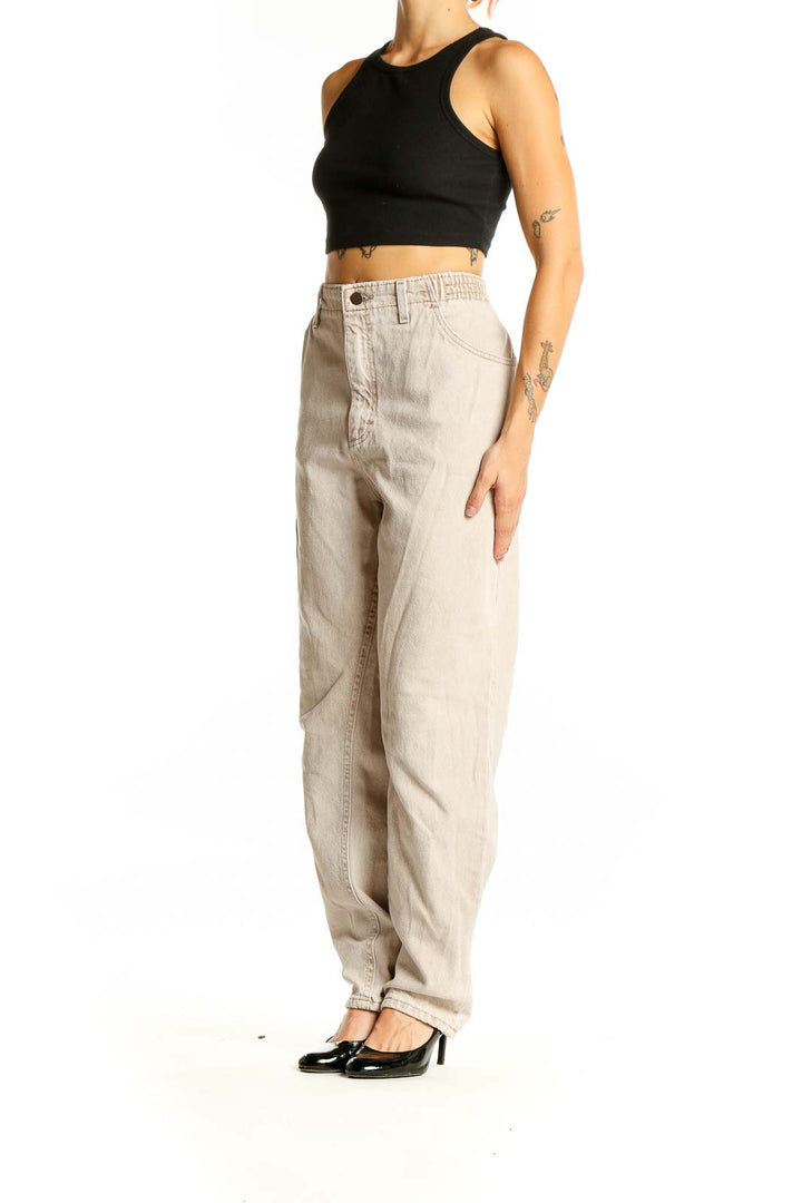 Front view of Lee beige high-waisted wide-leg denim jeans on model