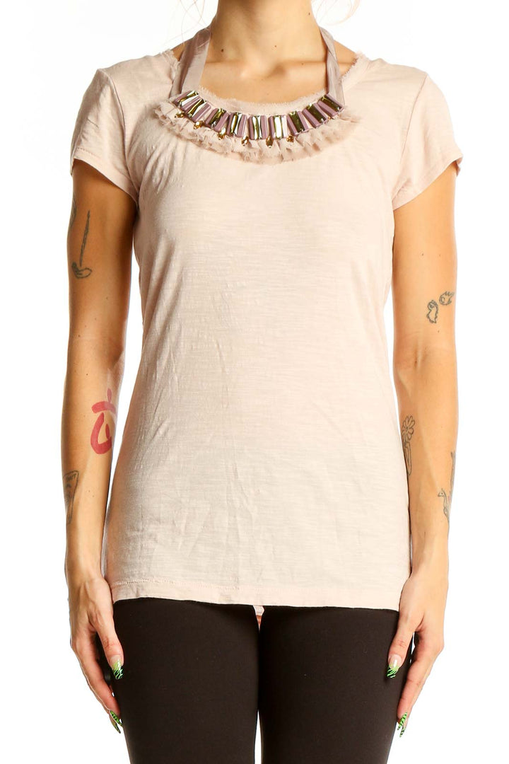 Front view of LOFT blush cotton top with embellished neckline