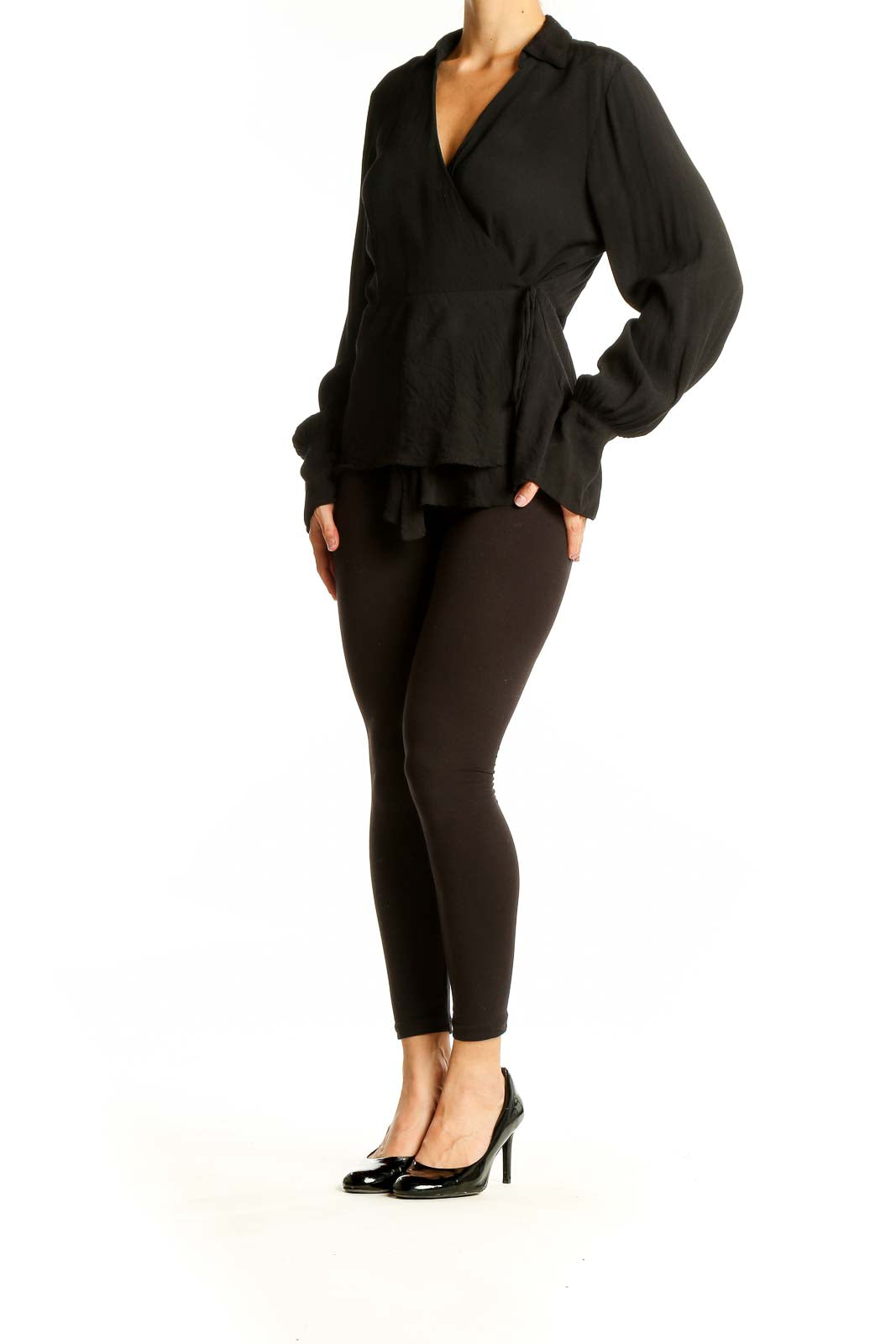 Front view of J.Crew black wrap-style viscose blouse with V-neckline