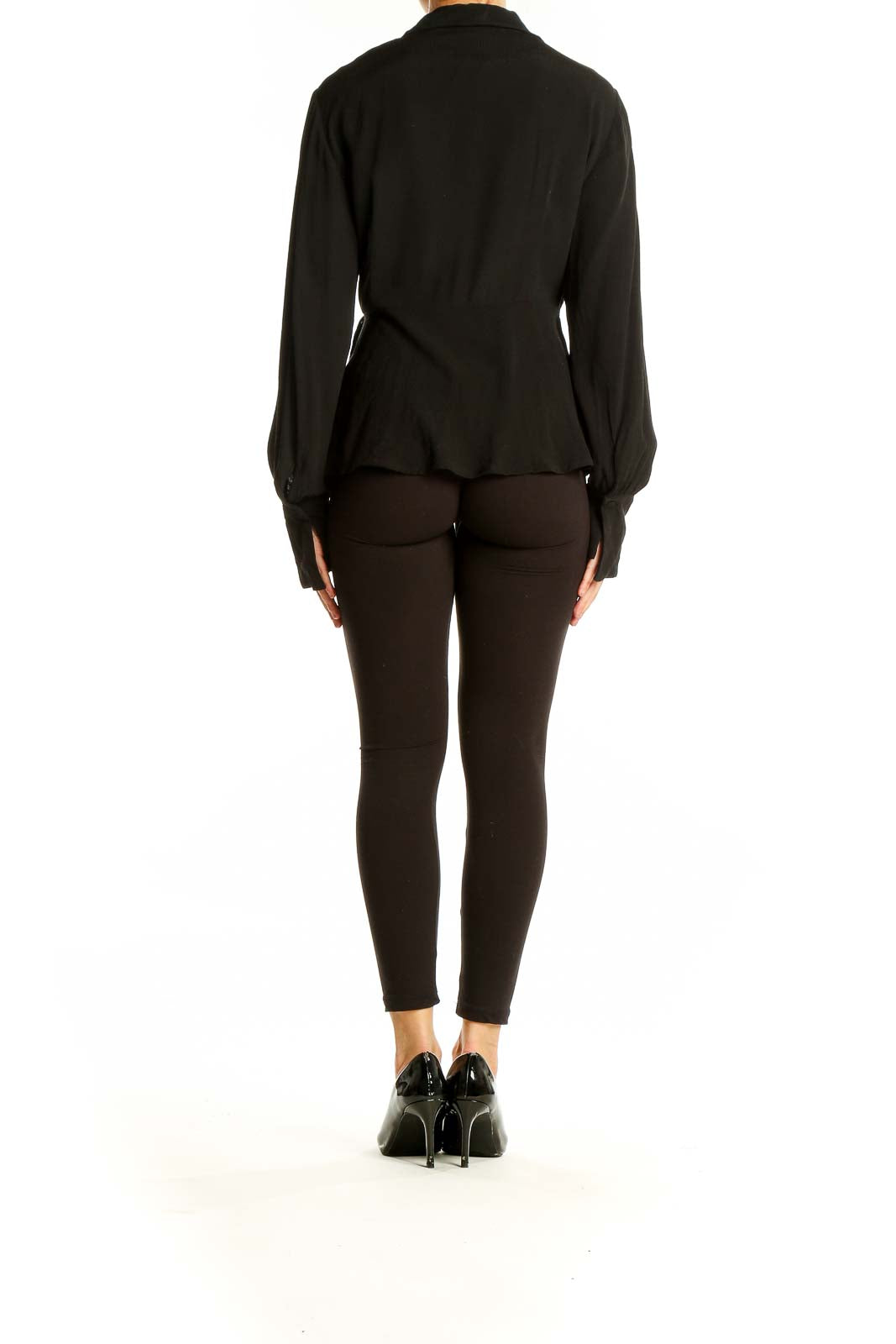 Back view of J.Crew black wrap-style viscose blouse showing peplum-like hem