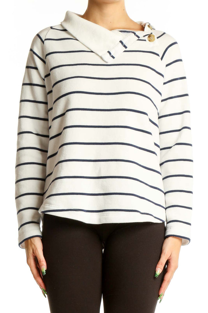 Front view of J.Crew white knit top with navy stripes and asymmetrical collar