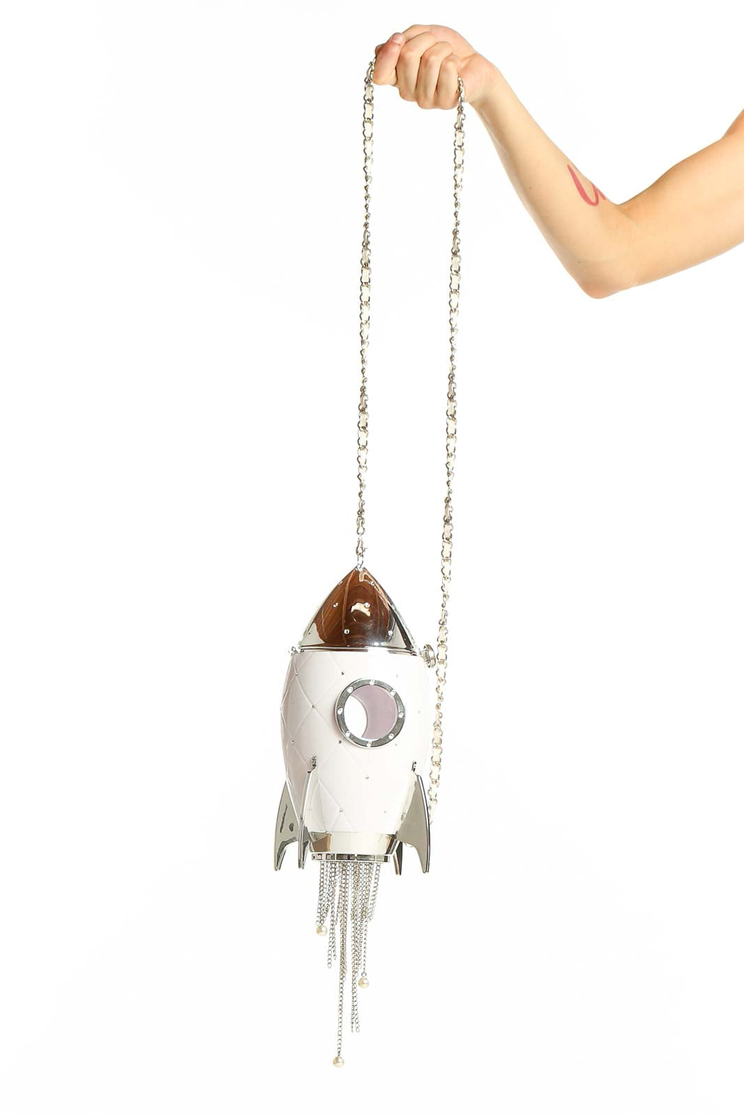 White rocket ship crossbody bag with silver chain strap