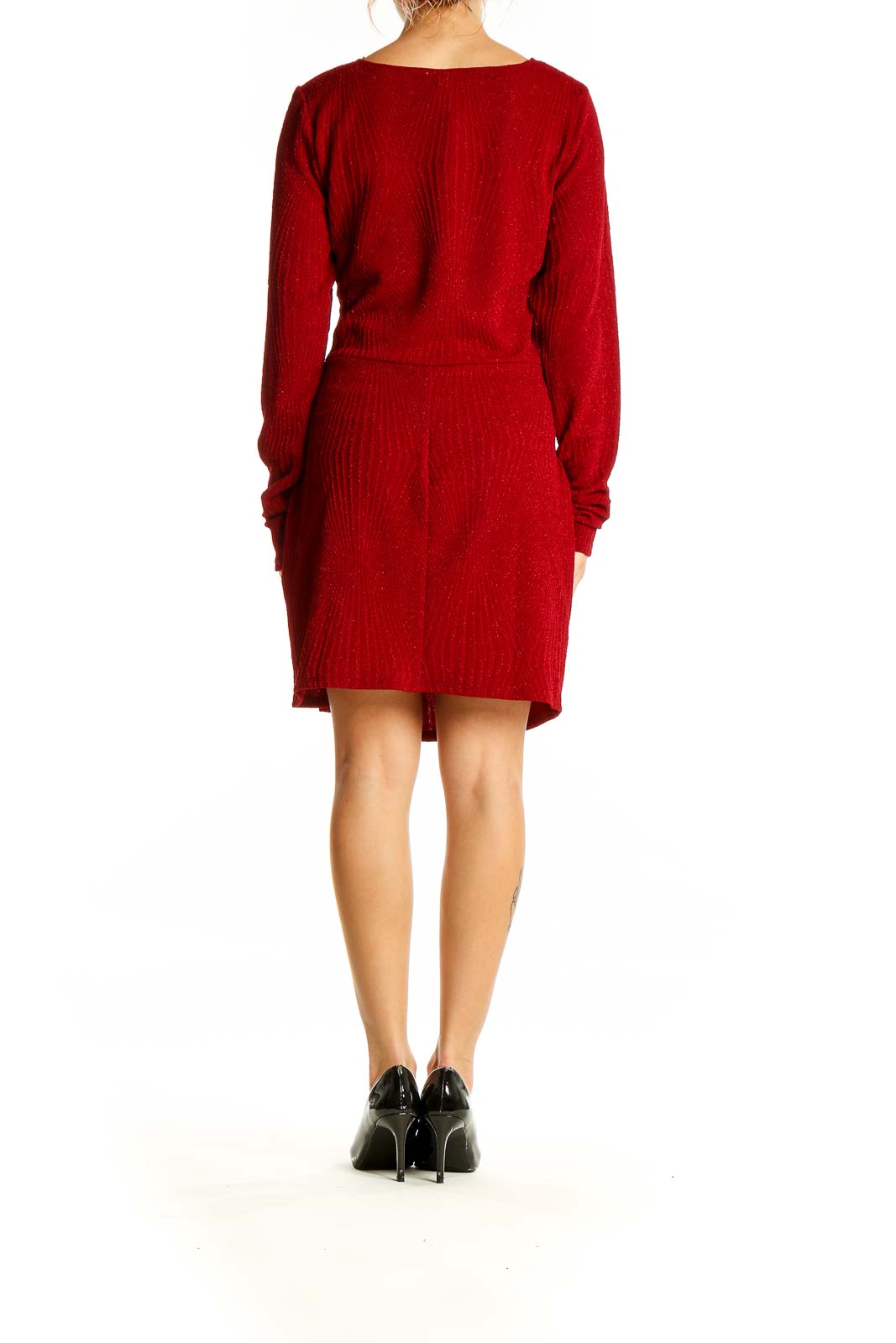 Back view of red metallic wrap dress showing knee-length cut and fitted silhouette