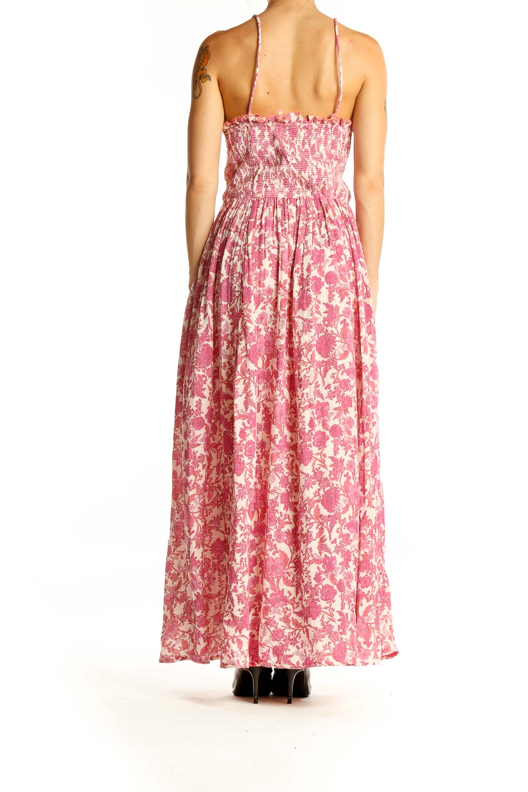 Back view of Free People pink floral maxi dress showing open back design