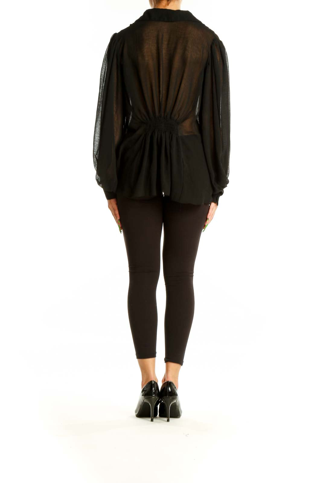 Back view of Zara black sheer blouse showing gathered detail and flowing silhouette