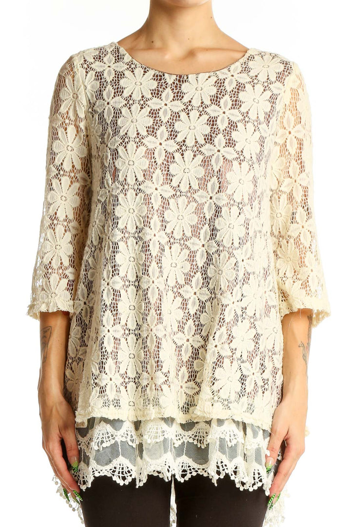 Front view of SilkRoll cream floral lace overlay tunic top with 3/4 sleeves